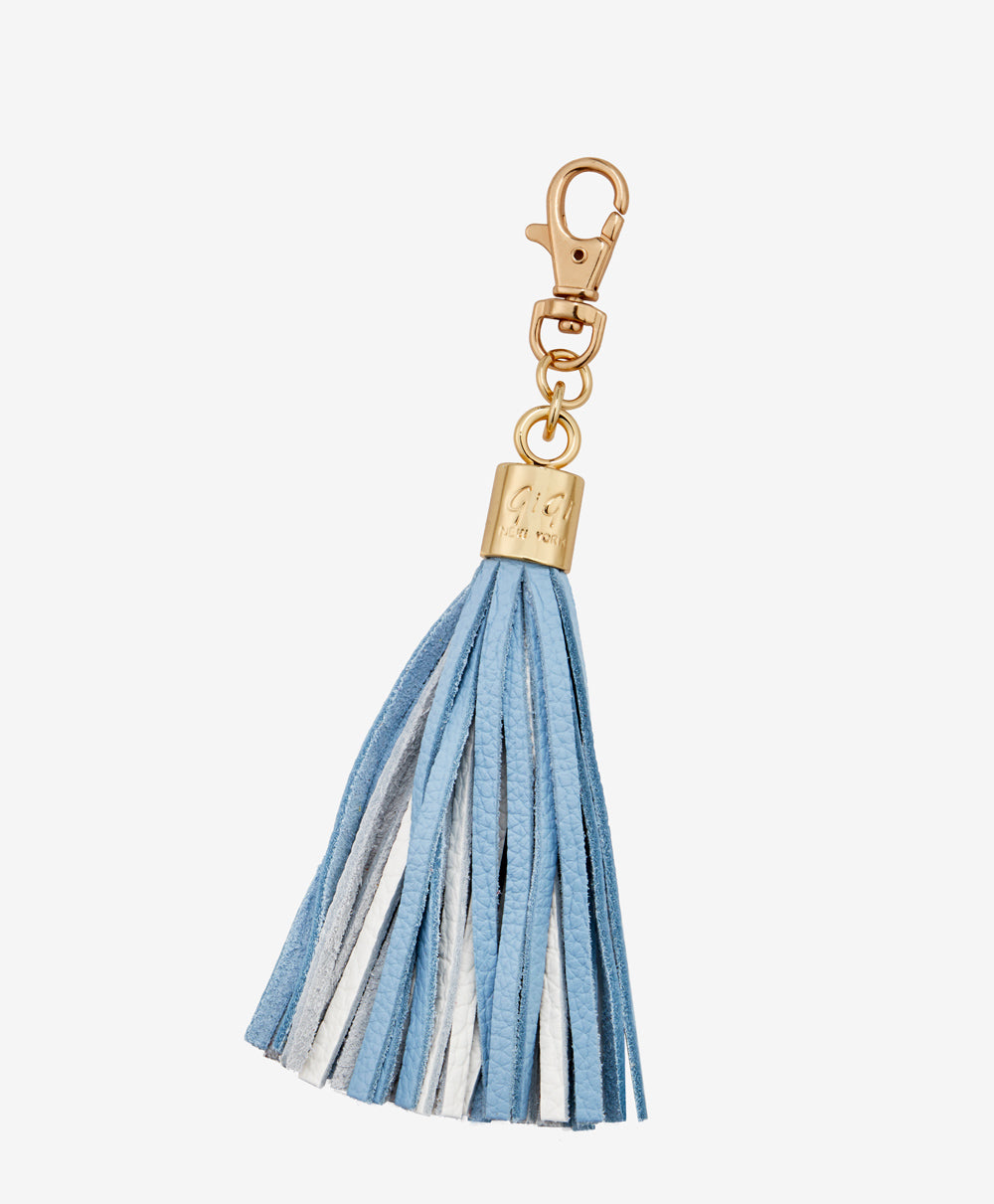 Leather tassel bag outlet charm